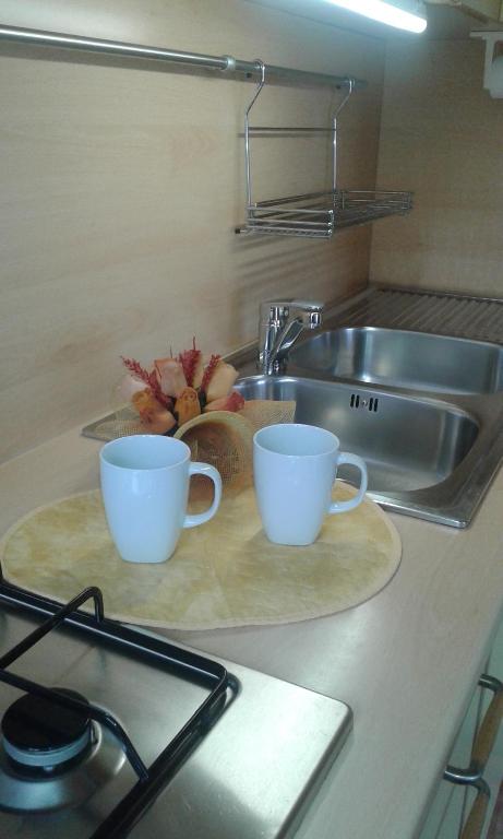A kitchen or kitchenette at Appartamento Lauretta