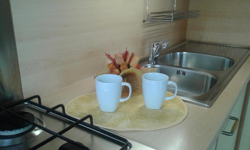 A kitchen or kitchenette at Appartamento Lauretta