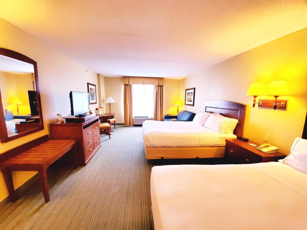 Postel nebo postele na pokoji v ubytování Beach Boutique Hotel