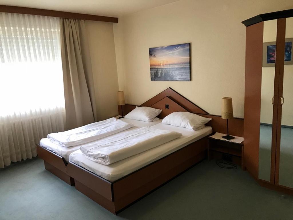 Postel nebo postele na pokoji v ubytování City-Hotel Kaiserhof