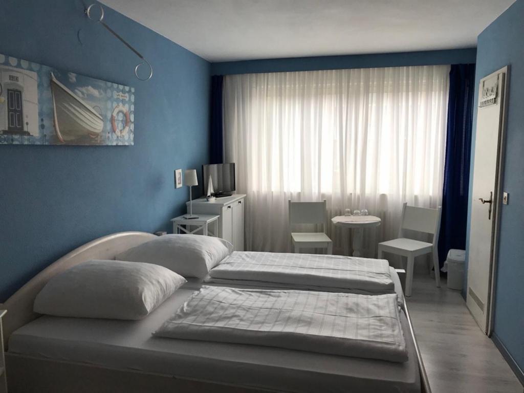 Postel nebo postele na pokoji v ubytování City-Hotel Kaiserhof