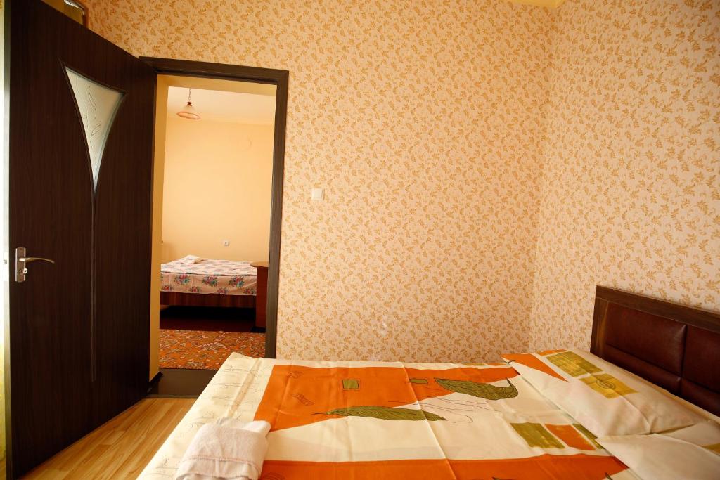 Postel nebo postele na pokoji v ubytování Nature House