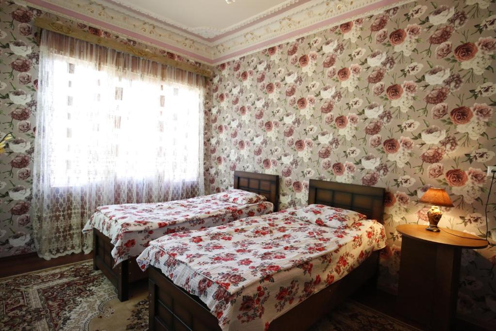 Postel nebo postele na pokoji v ubytování Nature House