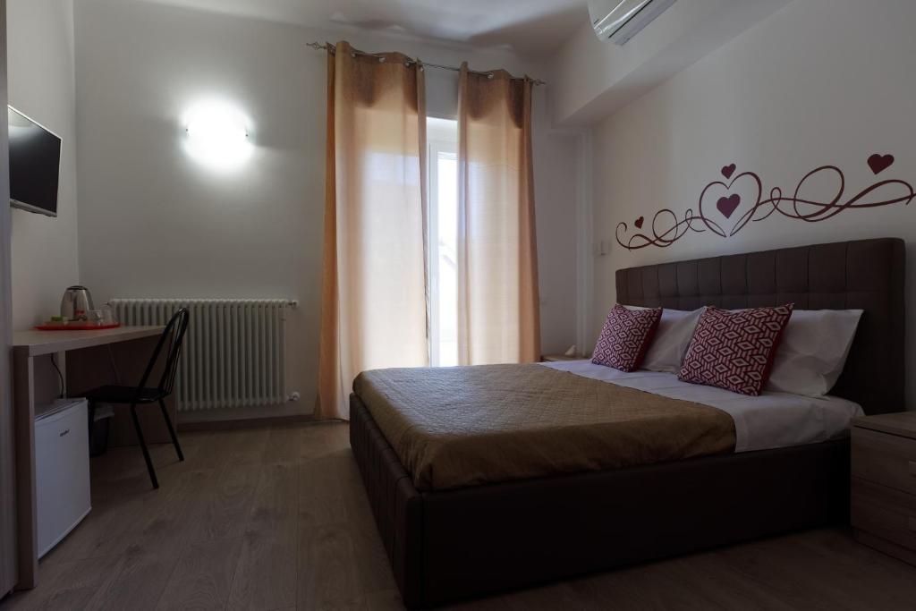 Postel nebo postele na pokoji v ubytování Le Coccole