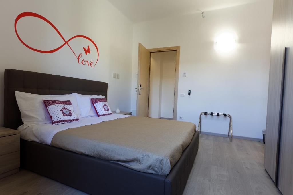 Postel nebo postele na pokoji v ubytování Le Coccole