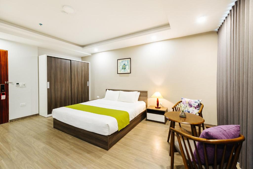 Postel nebo postele na pokoji v ubytování Hana 2 Apartment & Hotel Bac Ninh