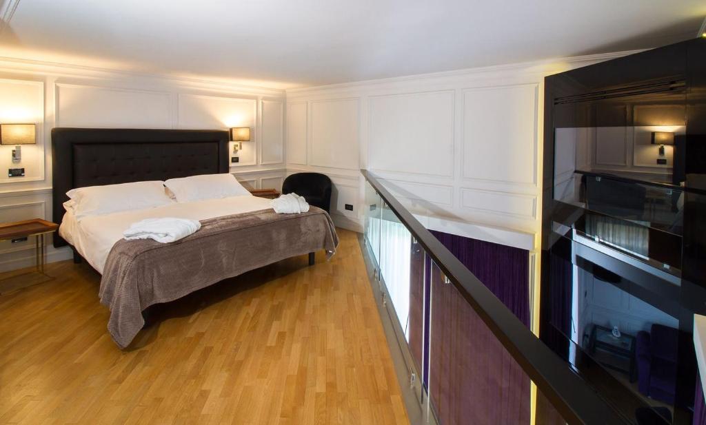 Postel nebo postele na pokoji v ubytování Hotel Europa