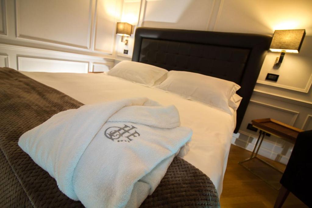 Postel nebo postele na pokoji v ubytování Hotel Europa