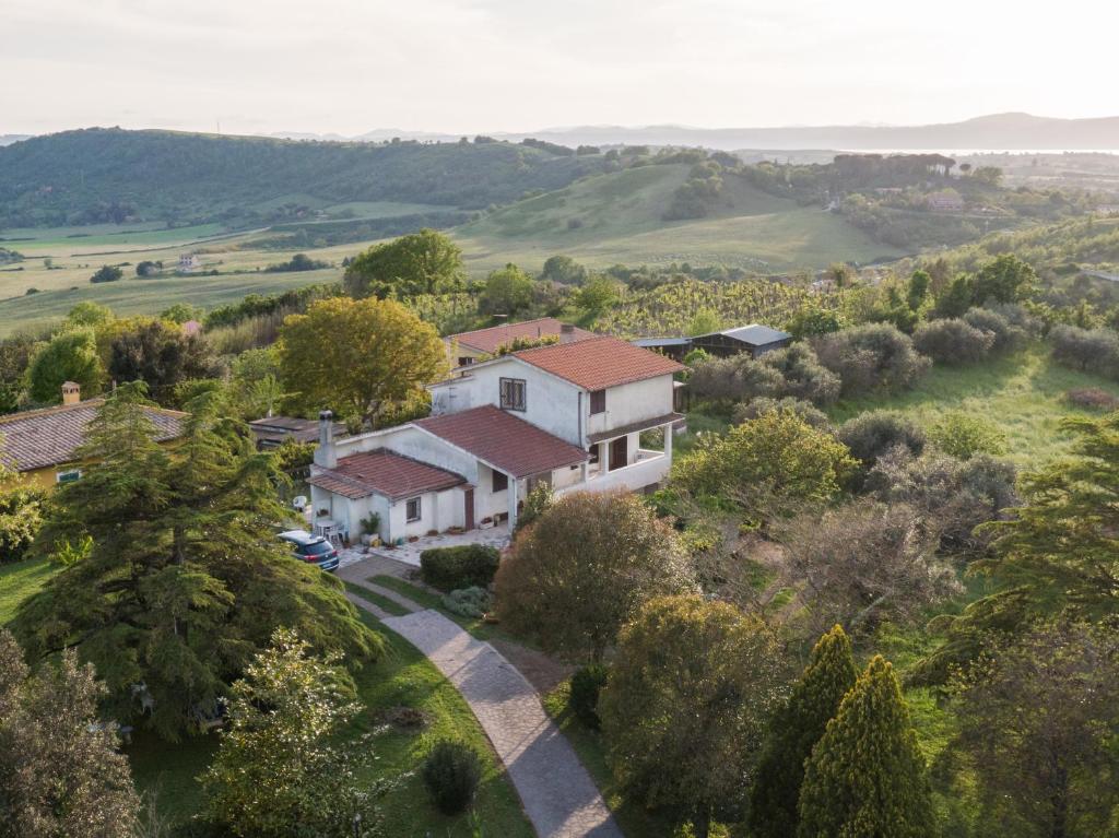 an aerial view of a house in the hills at Deliziosa Villa Panoramica in Campagnano di Roma