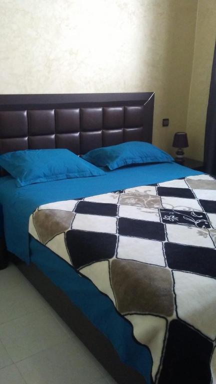 Llit o llits en una habitació de Dar new waves