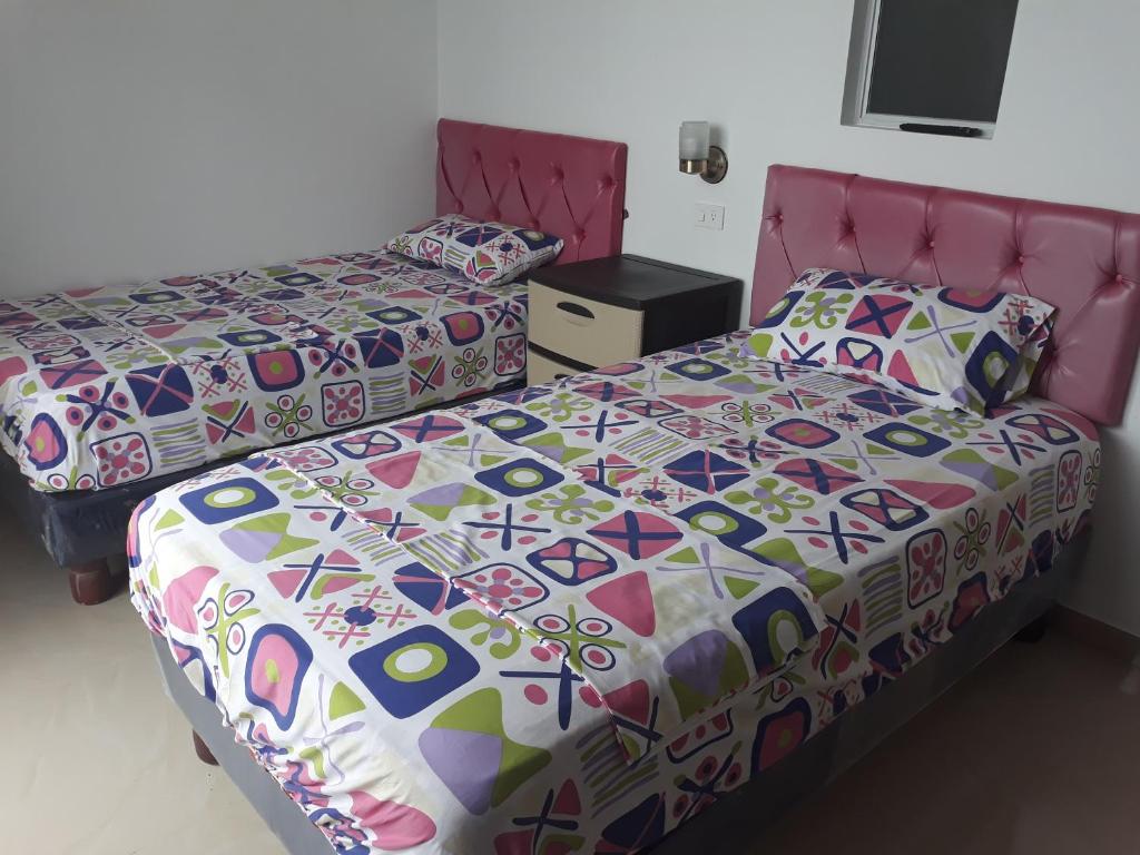 Postel nebo postele na pokoji v ubytování Hotel Almond Beach