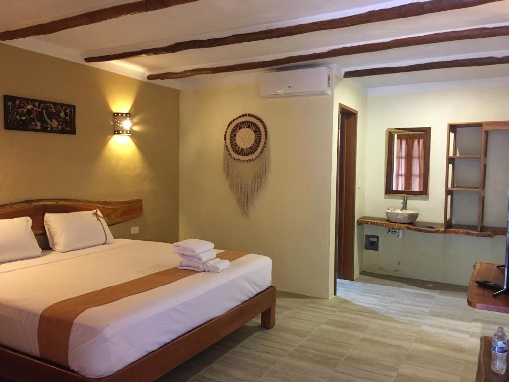 Una cama o camas en una habitación de Casa San Juan