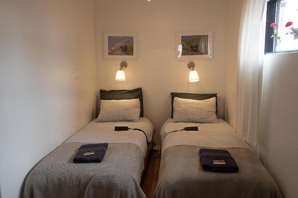 Postel nebo postele na pokoji v ubytování Sudavik guesthouse