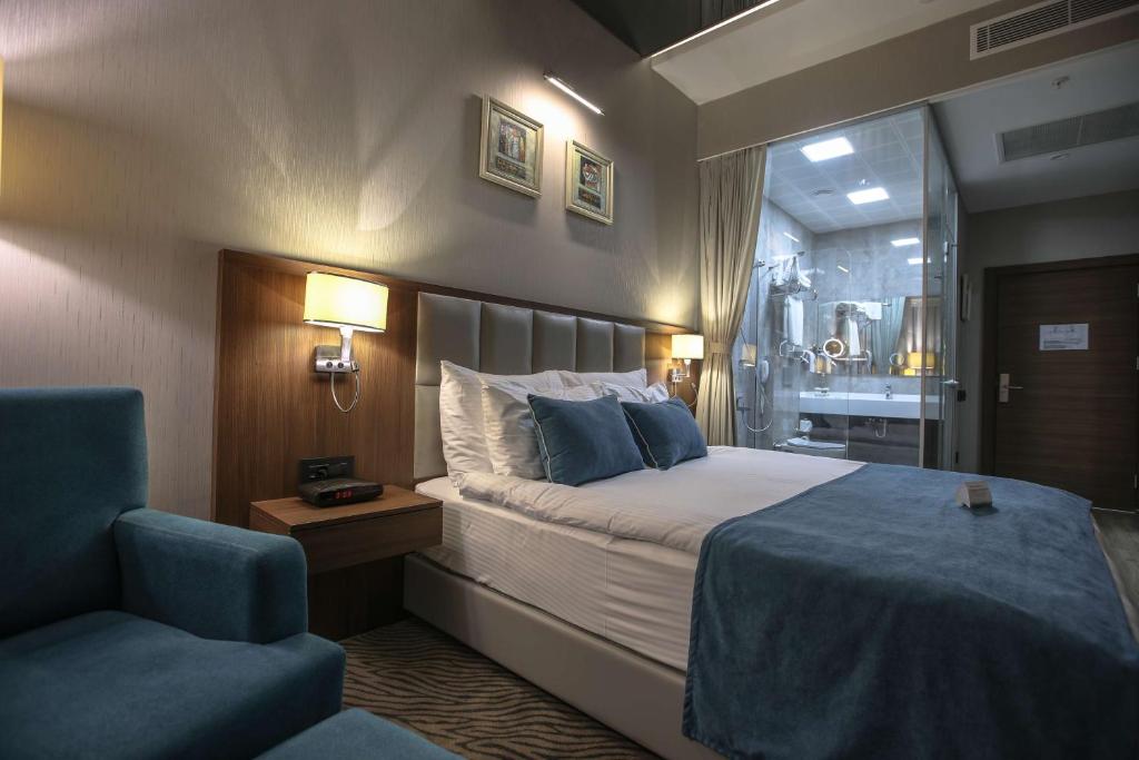 Postel nebo postele na pokoji v ubytování Best Western Premier Karsiyaka Convention & Spa Hotel