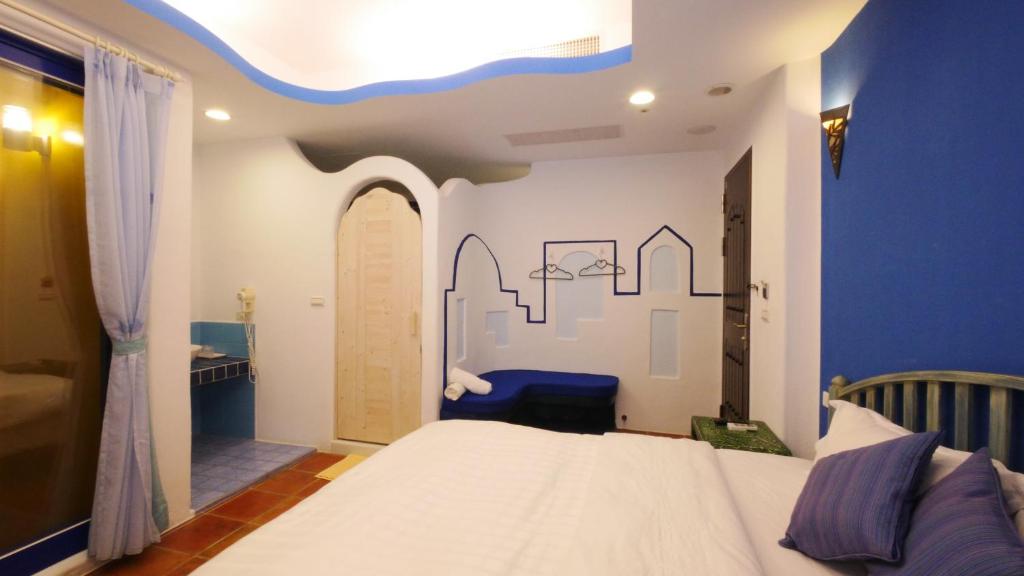 Postel nebo postele na pokoji v ubytování Long Yuan Ju Homestay