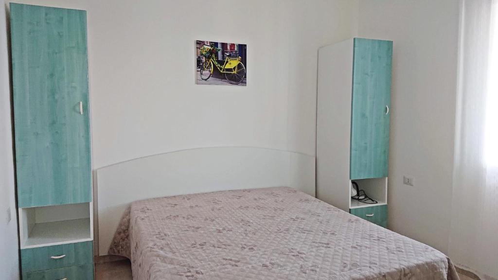 Łóżko lub łóżka w pokoju w obiekcie LA CASA AL MARE a Peschici