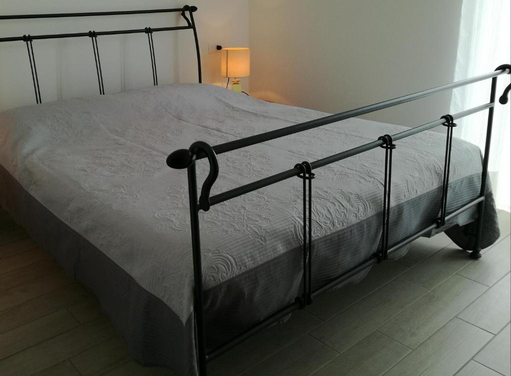 Postel nebo postele na pokoji v ubytování Levanto House