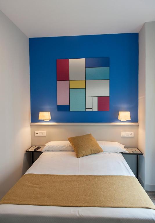Posteľ alebo postele v izbe v ubytovaní Hotel Hito