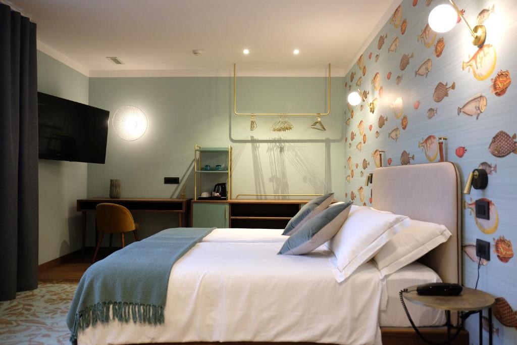 Postel nebo postele na pokoji v ubytování Hotel Luise