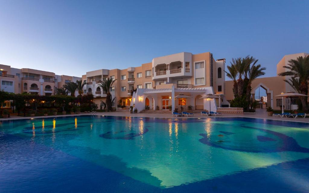 Bazén v ubytování Le Corail Appart'Hotel Yasmine Hammamet nebo v jeho okolí
