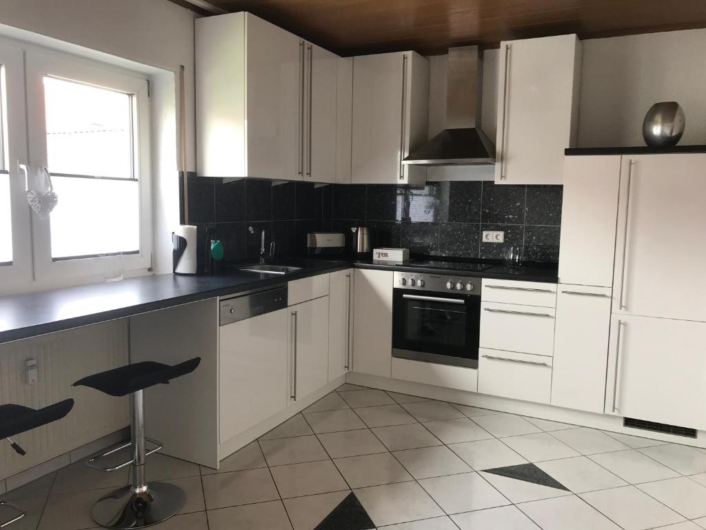 Kuchyň nebo kuchyňský kout v ubytování xxl Apartment Sinsheim