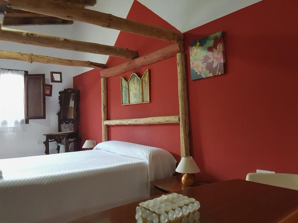 Postel nebo postele na pokoji v ubytování La Hacienda Del Campo