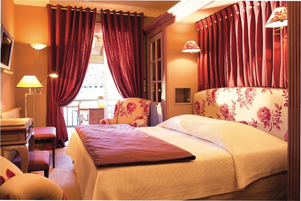 Postel nebo postele na pokoji v ubytování Villa MARSAN - Maison Hervé-Martin GARRAPIT