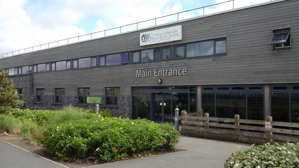 a main entrance to a main office building at TEA in Liverpool - Private - Quiet - Ground Floor - En-suite - Walk-in-shower in Liverpool