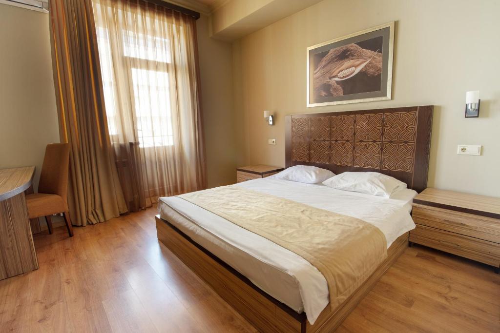 Postel nebo postele na pokoji v ubytování Kantar Hostel