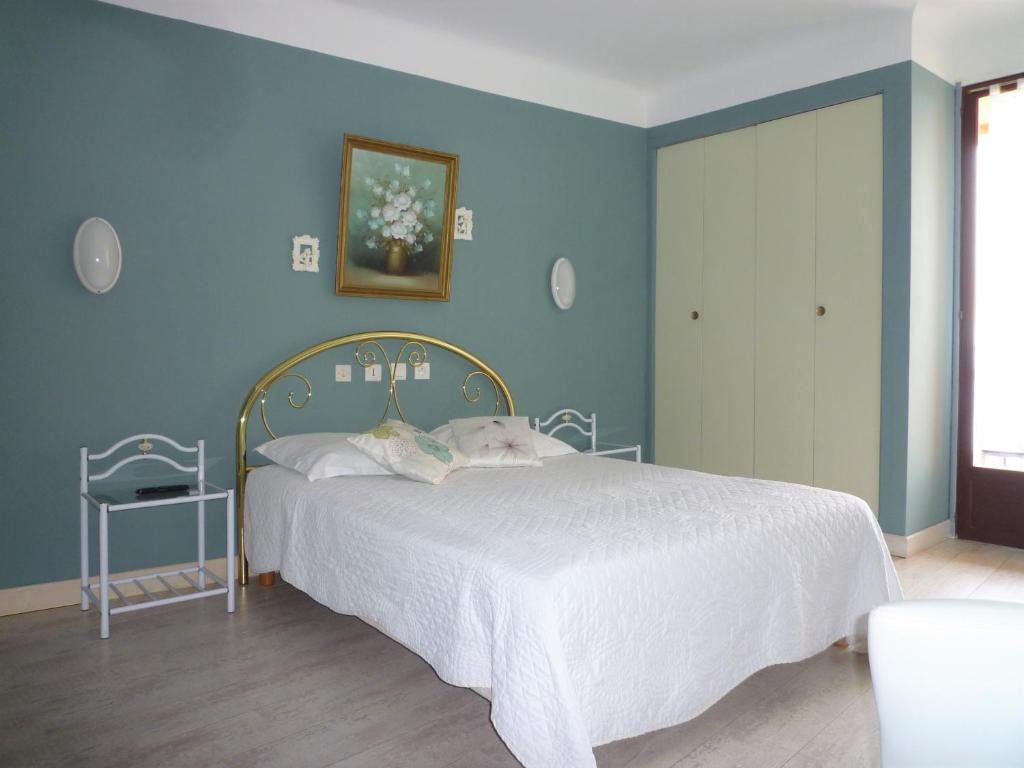 Postel nebo postele na pokoji v ubytování Hotel Celine
