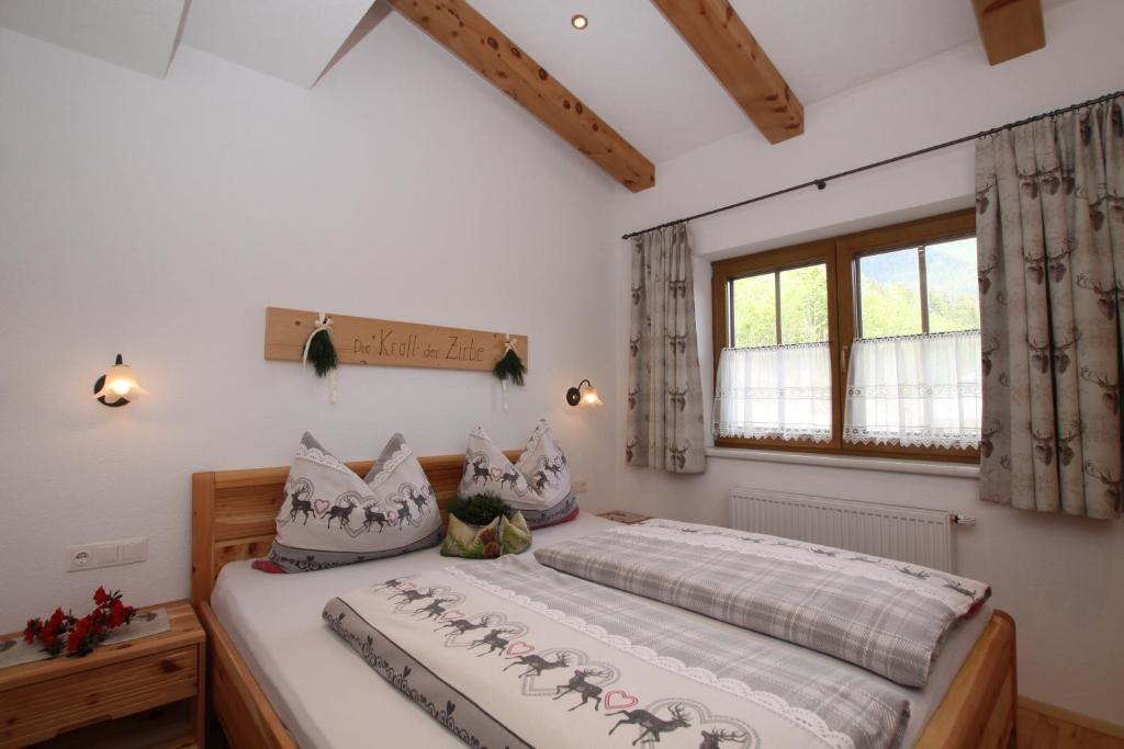 Postel nebo postele na pokoji v ubytování Landhaus Granat