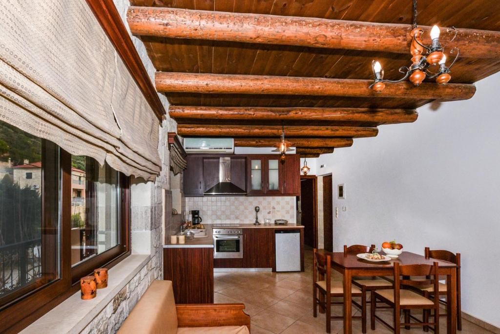 Kuchyň nebo kuchyňský kout v ubytování Ariadni Apartments