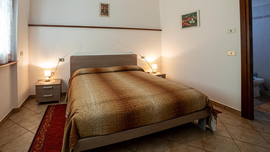 Postel nebo postele na pokoji v ubytování albergo bellavista