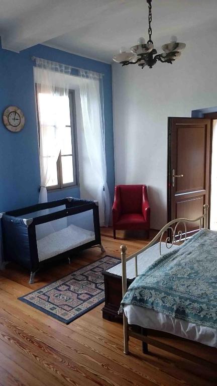 Łóżko lub łóżka w pokoju w obiekcie La Ca' Vegia