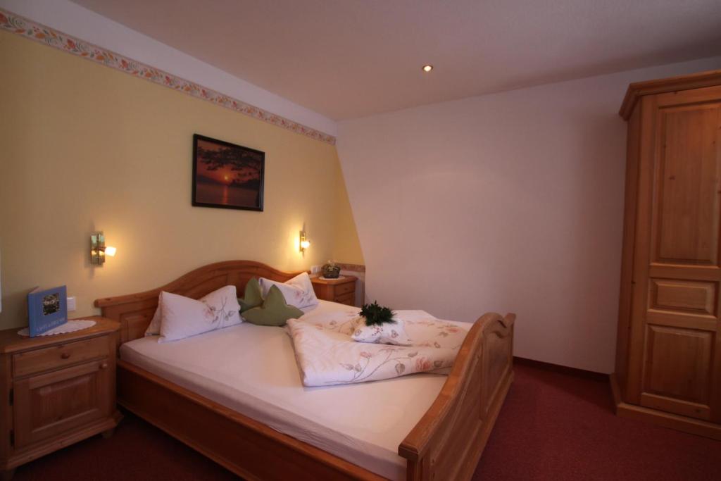 Postel nebo postele na pokoji v ubytování Landhaus Granat