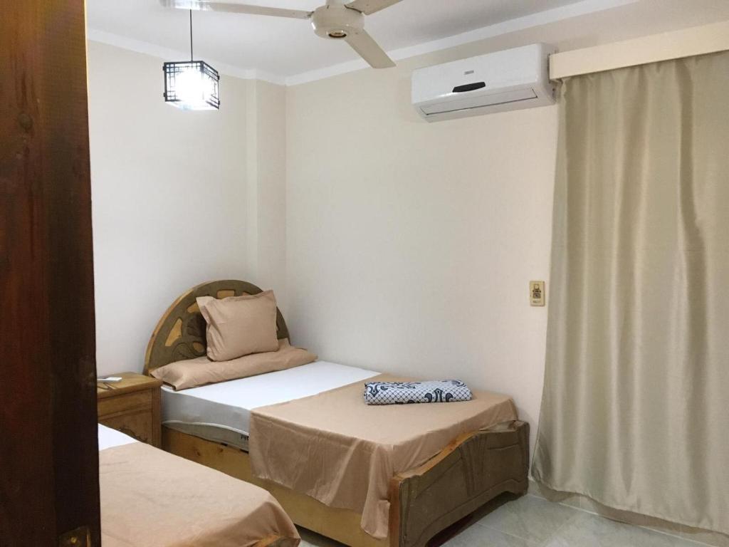Cama ou camas em um quarto em Apartment in Luxor city center-Nil