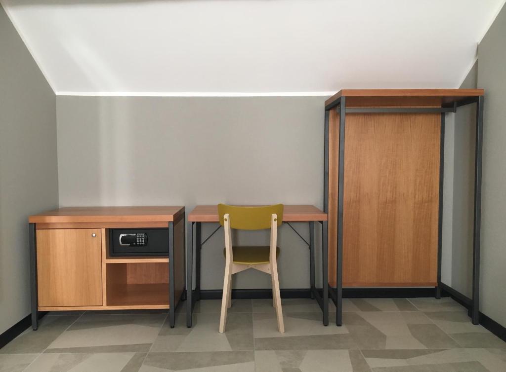 Kuchyň nebo kuchyňský kout v ubytování APARTHOTEL CASA MIA