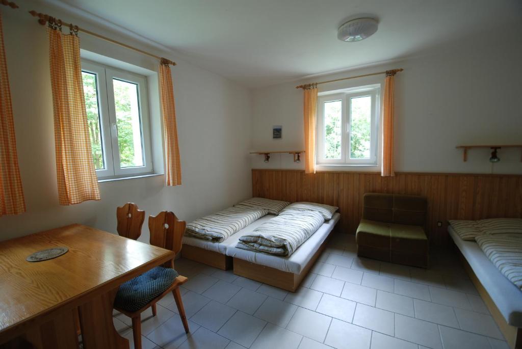 Postel nebo postele na pokoji v ubytování Na Černém potoce