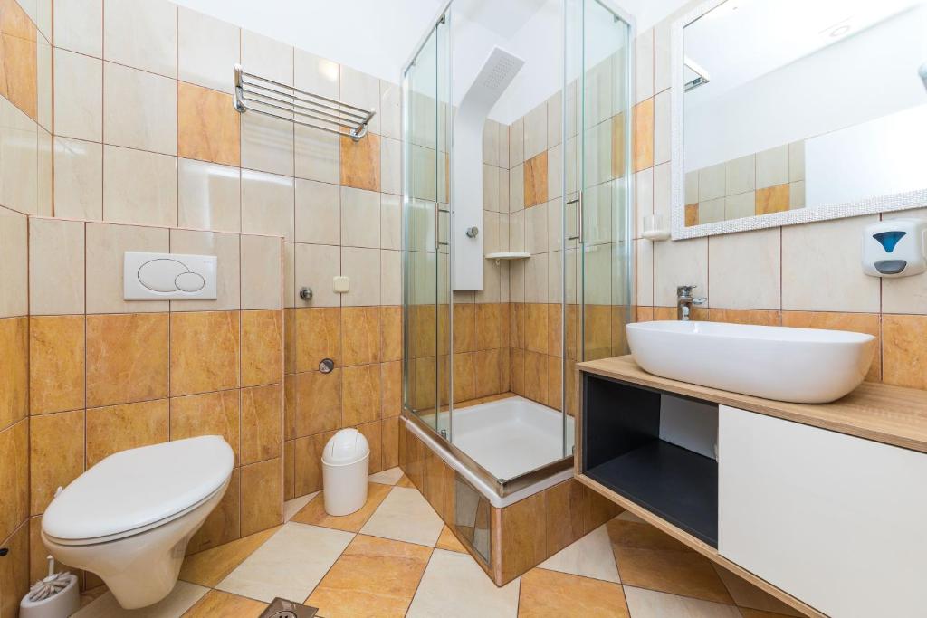 Koupelna v ubytování Apartments Gavran