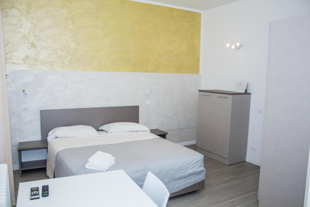 Llit o llits en una habitació de Hotel Stella Polare