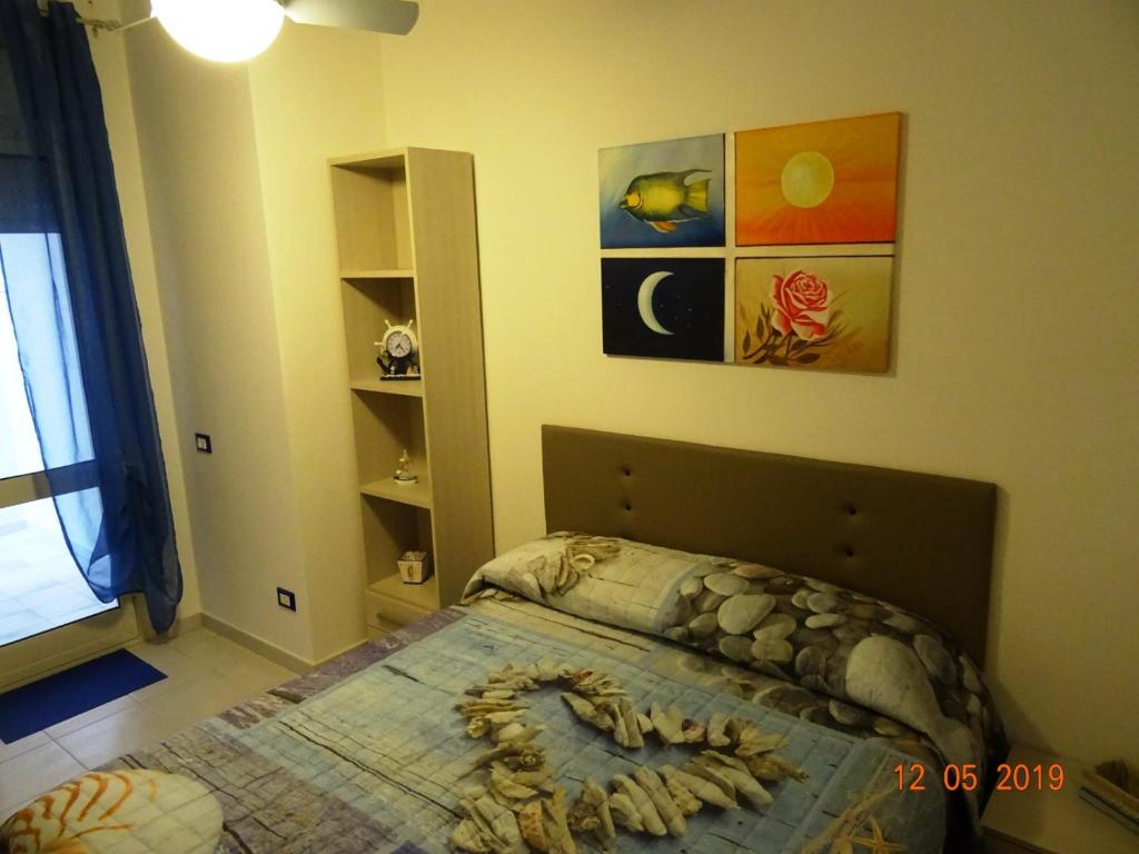 Krevet ili kreveti u jedinici u okviru objekta Villasimius Trivano Centro