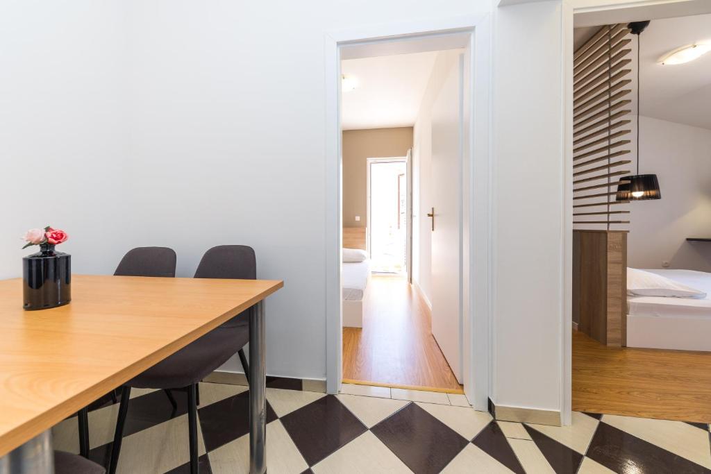 Postel nebo postele na pokoji v ubytování Apartments Gavran