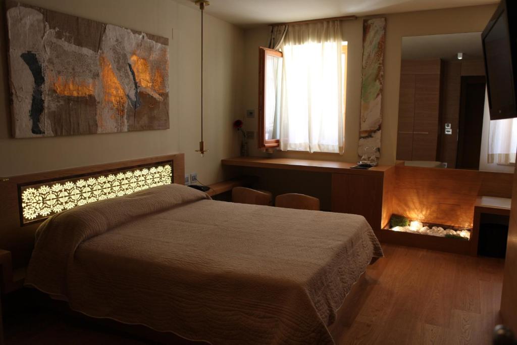 Postel nebo postele na pokoji v ubytování Mario's Garni