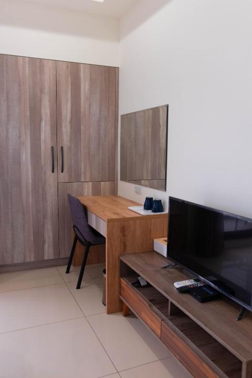TV a/nebo společenská místnost v ubytování Tung Shiang Homestay