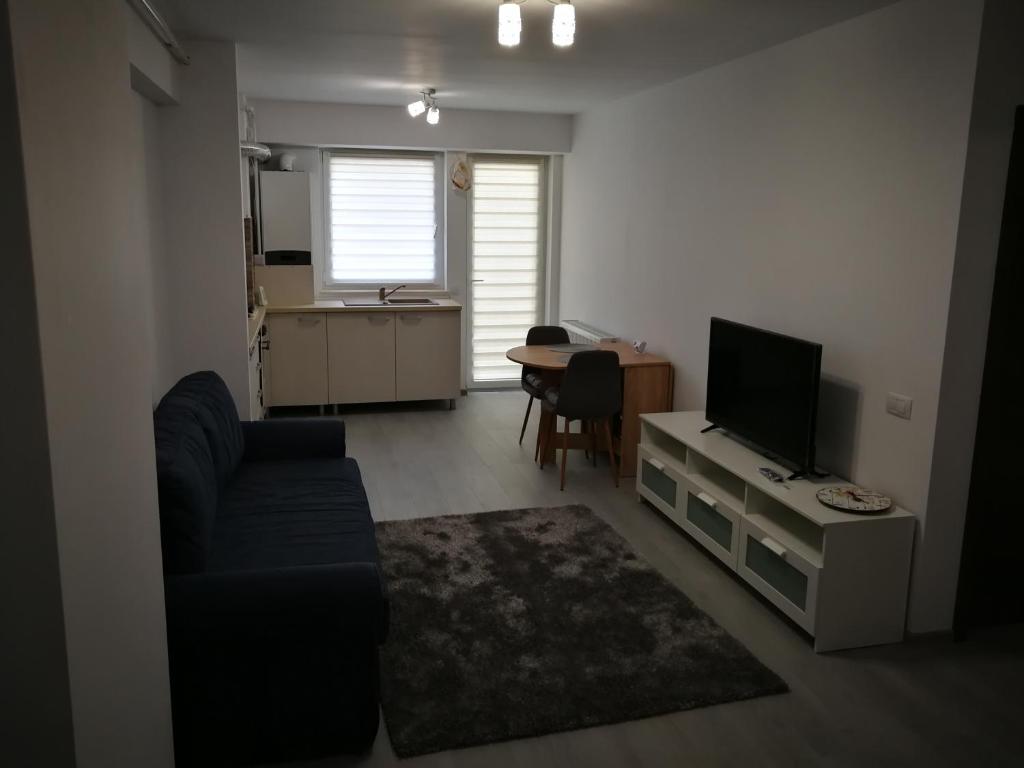 Ein Sitzbereich in der Unterkunft Apartament complex Bacovia