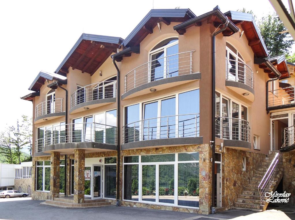 a large building with a lot of windows at Panorama Resort in Višegrad