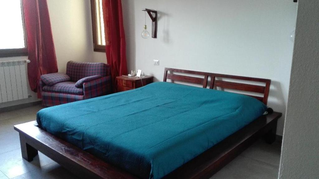 Posteľ alebo postele v izbe v ubytovaní B&B Il melograno