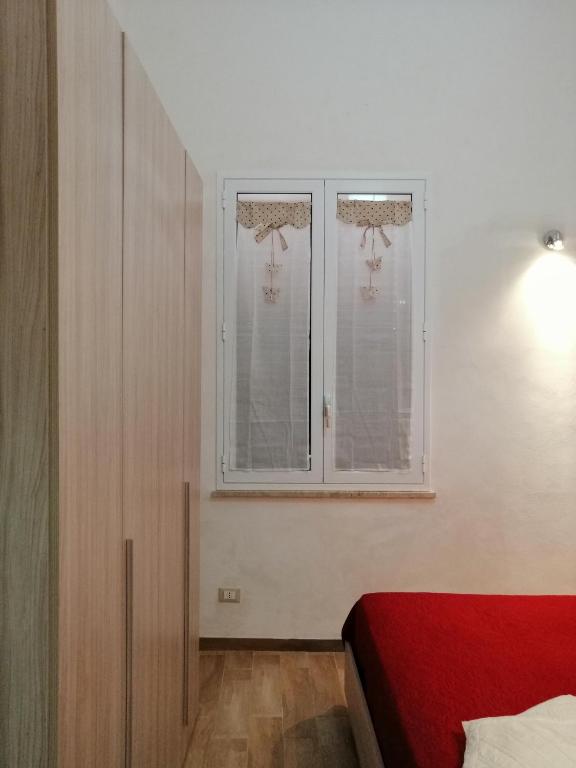 Łóżko lub łóżka w pokoju w obiekcie Casa per Vacanze a Marsala
