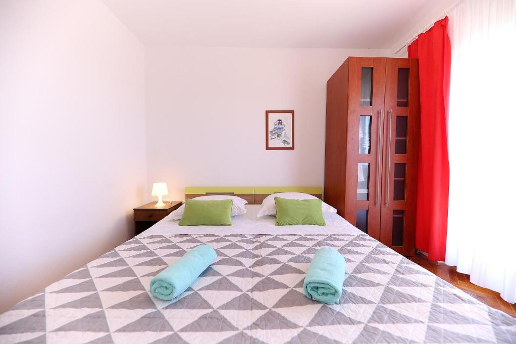 Postel nebo postele na pokoji v ubytování Apartments Anka
