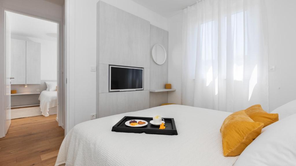 Posteľ alebo postele v izbe v ubytovaní Luxury Apartment La Mer
